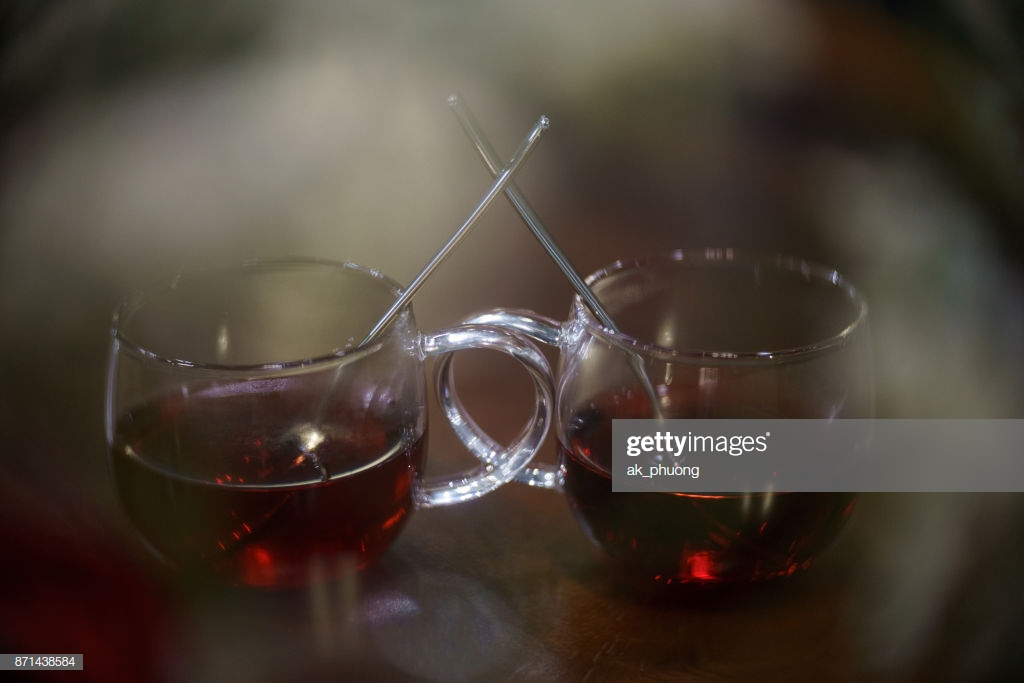 Tea Cup On Art Effective Background By Old Lens Stock Photo
