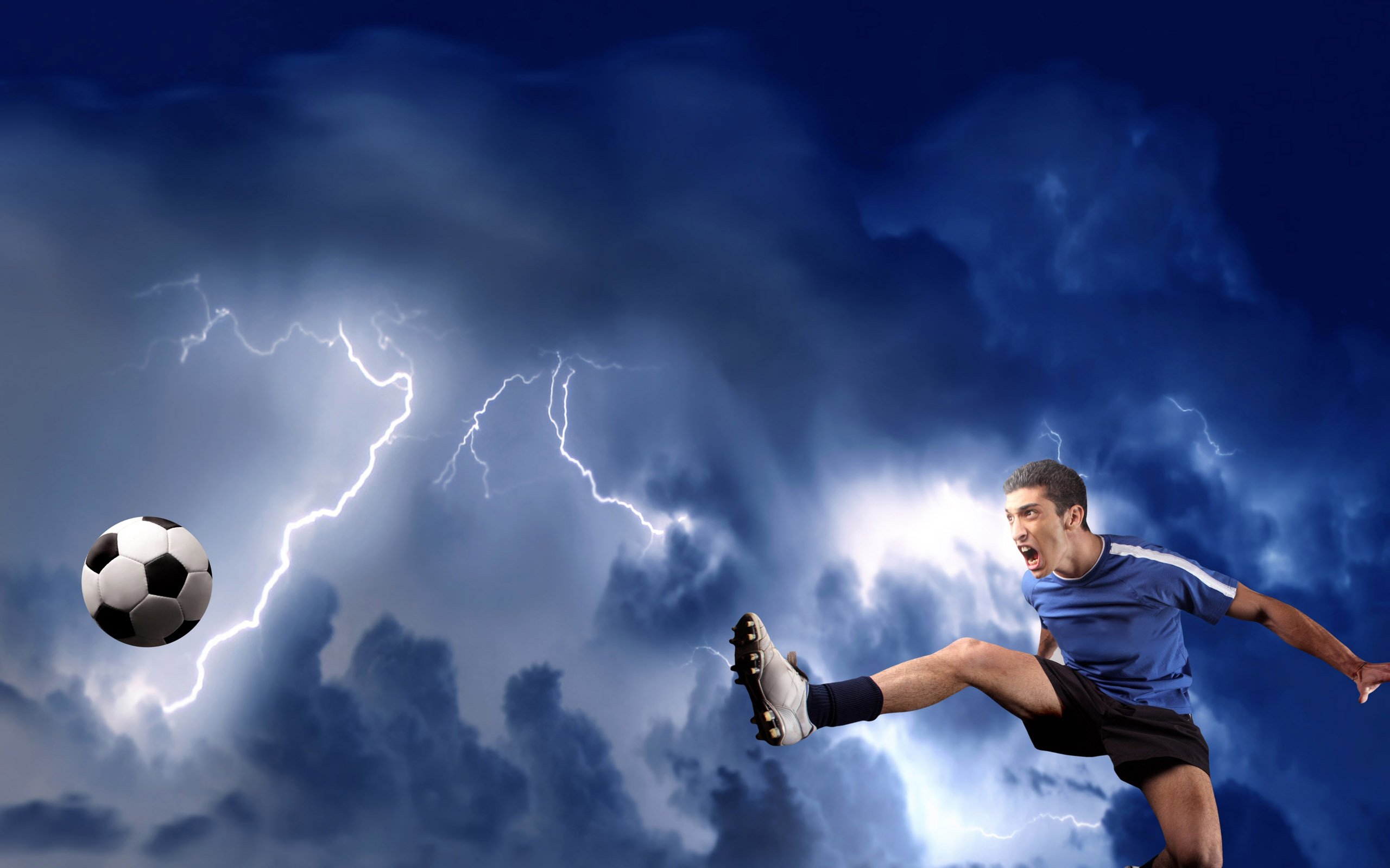 A soccer player kicks a ball mid-air against a dramatic backdrop of a stormy sky with lightning