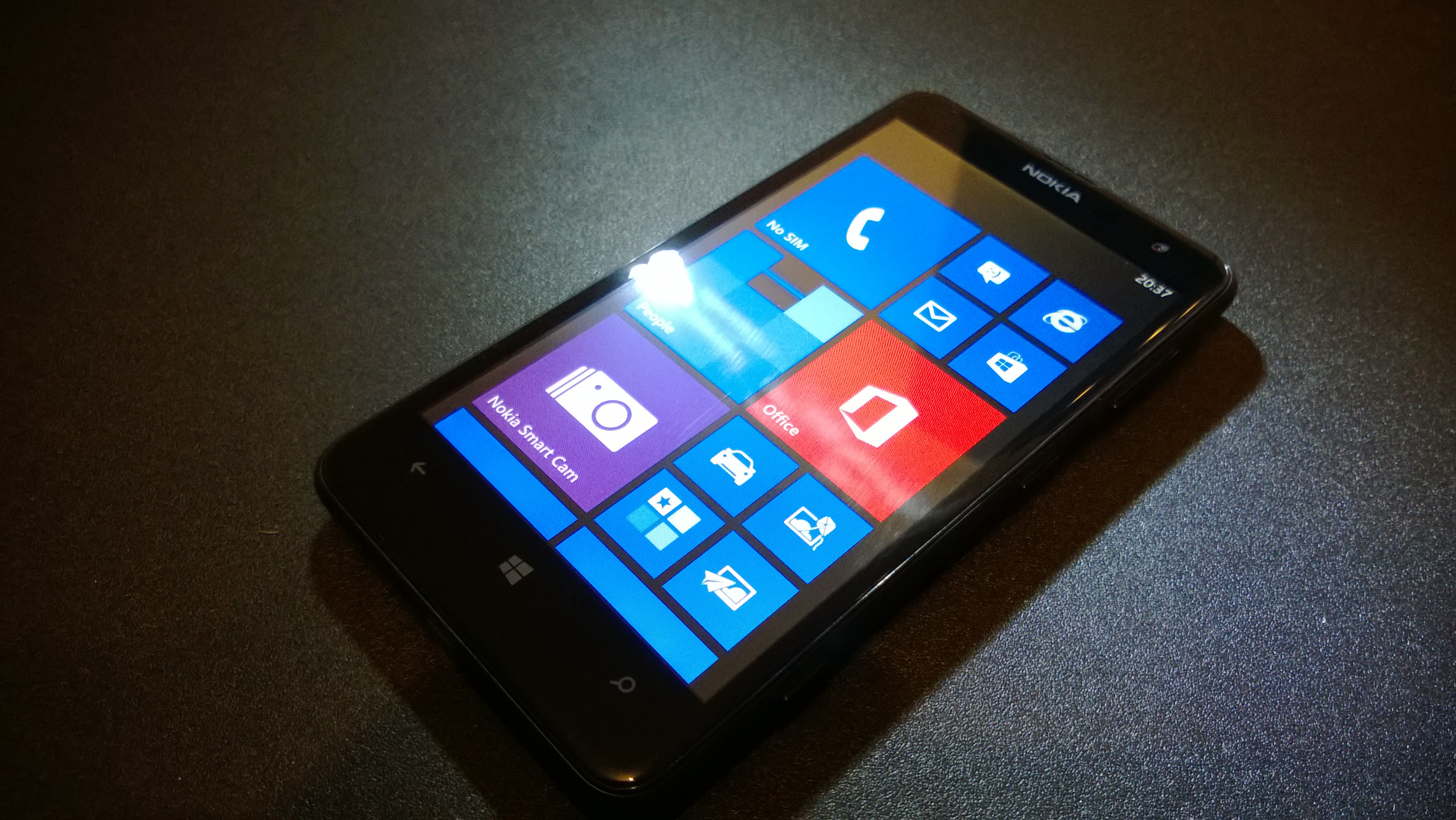 Nokia Lumia On A Gray Table Wallpaper And Image