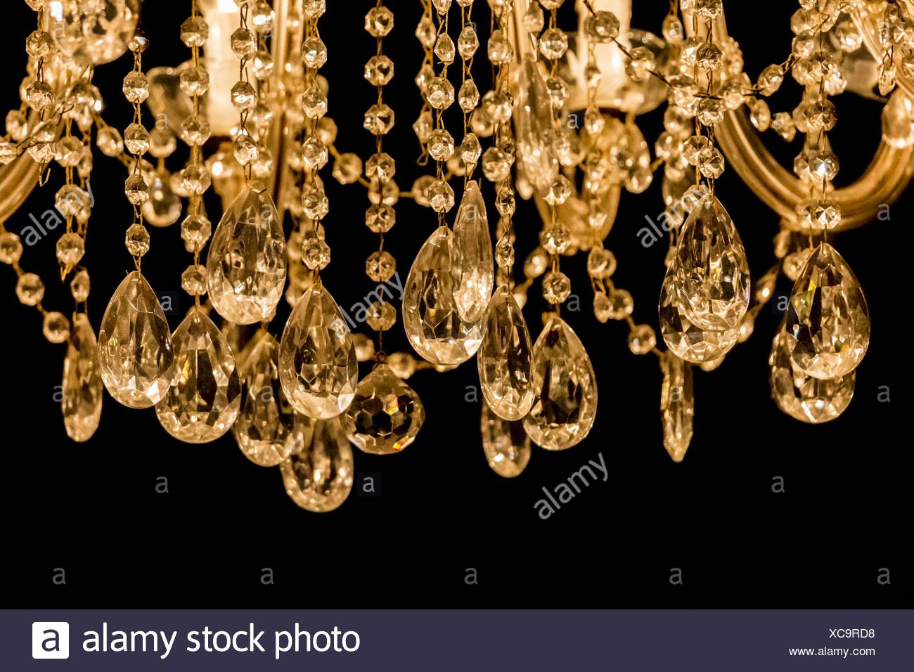 Gallant Chandelier With Light Candles And Dark Background Stock