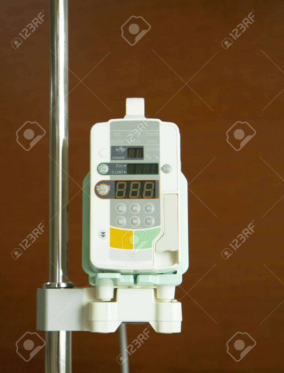 Infusion Pump With Brown Background Stock Photo Picture And