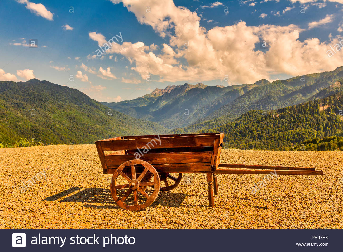 Nice Vintage Wooden Cart With Ocean Coastline Background Oia