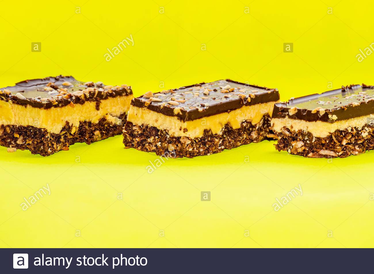 Free download Nutty brownie bars on a yellow background Stock Photo