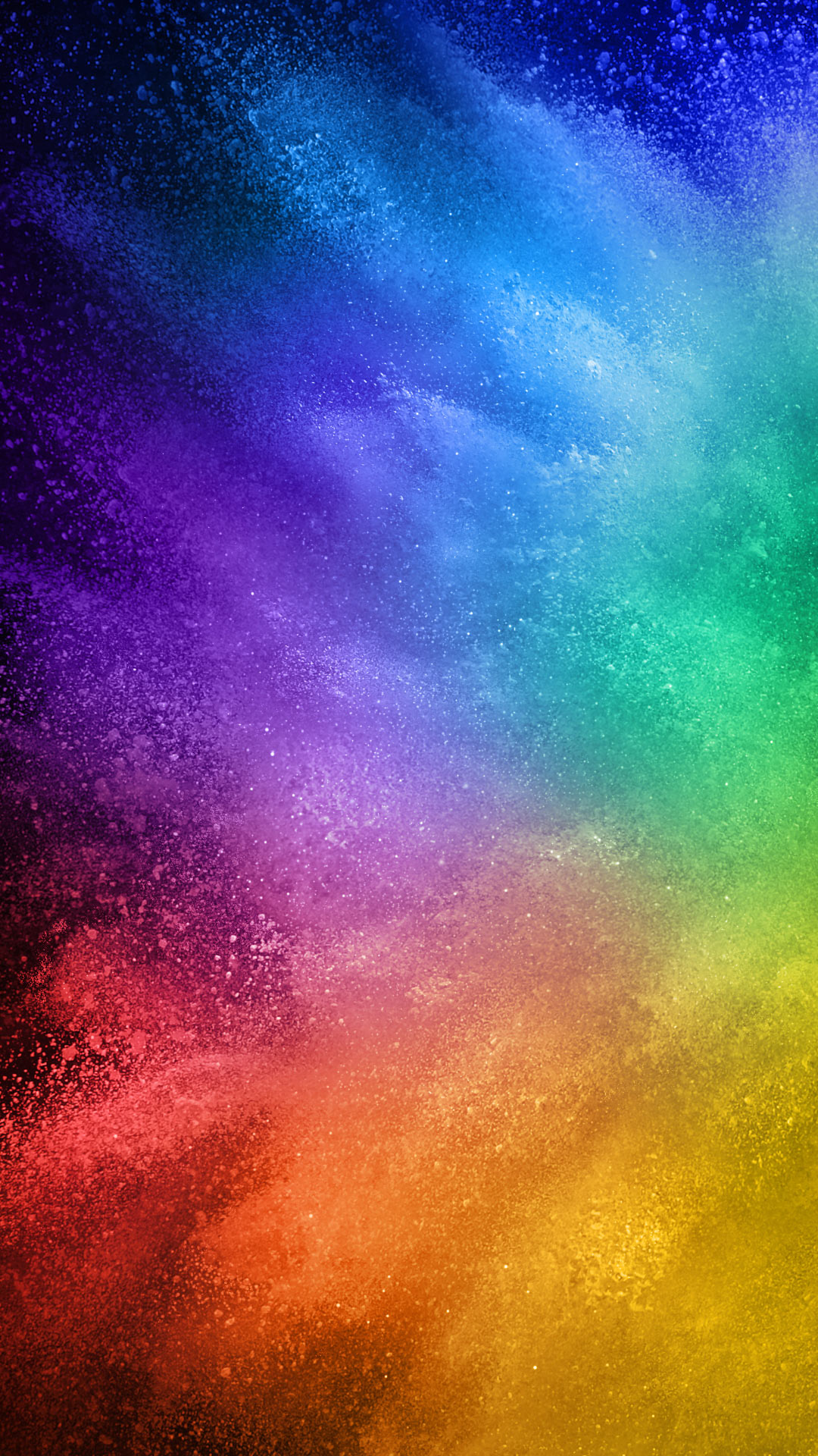 A vibrant explosion of colorful powder paint creating a rainbow effect on a black background
