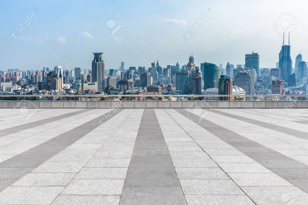 Empty Brick Floor With City Skyline Background Stock Photo