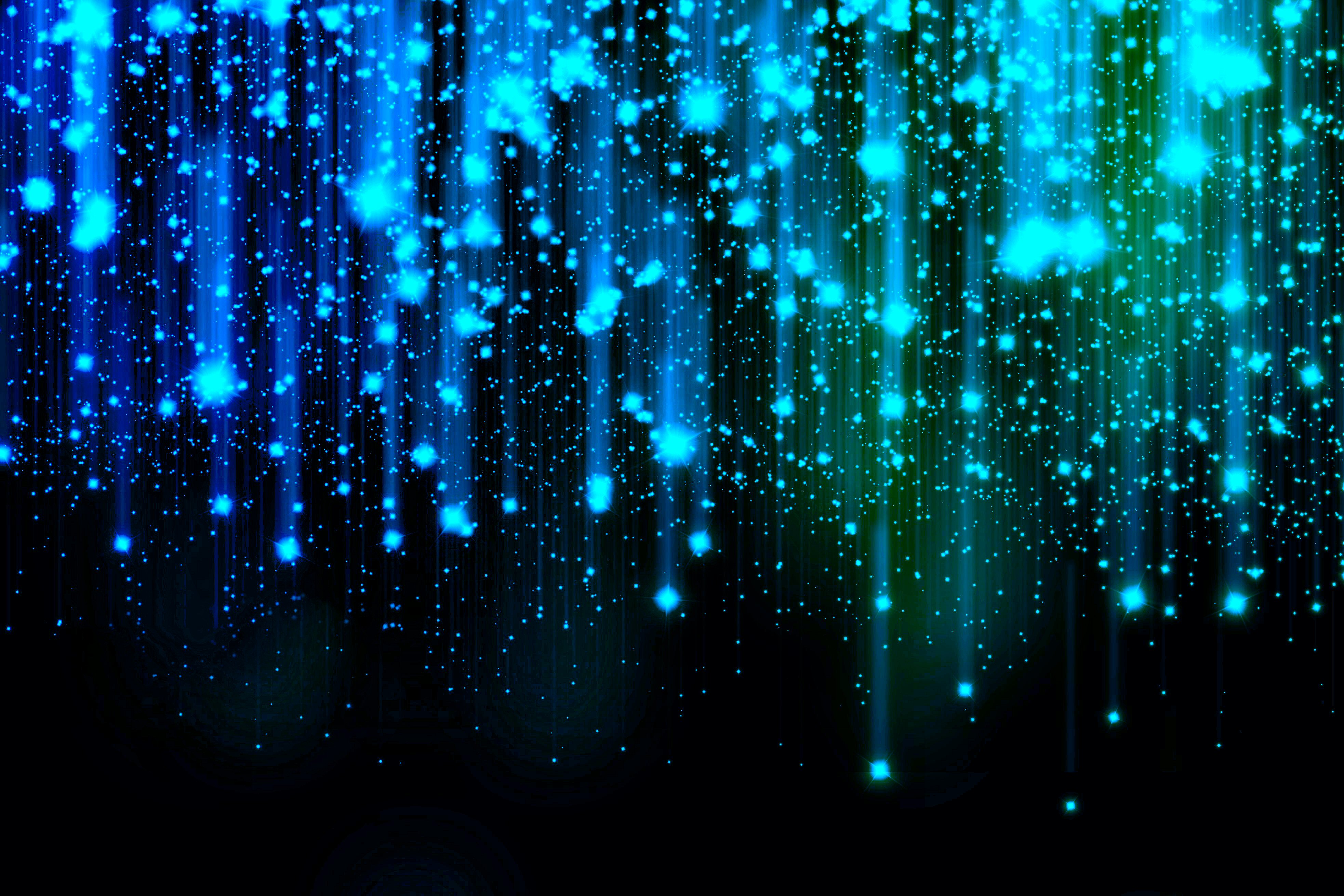 Abstract light blue streaks on a dark background, creating a dazzling visual effect