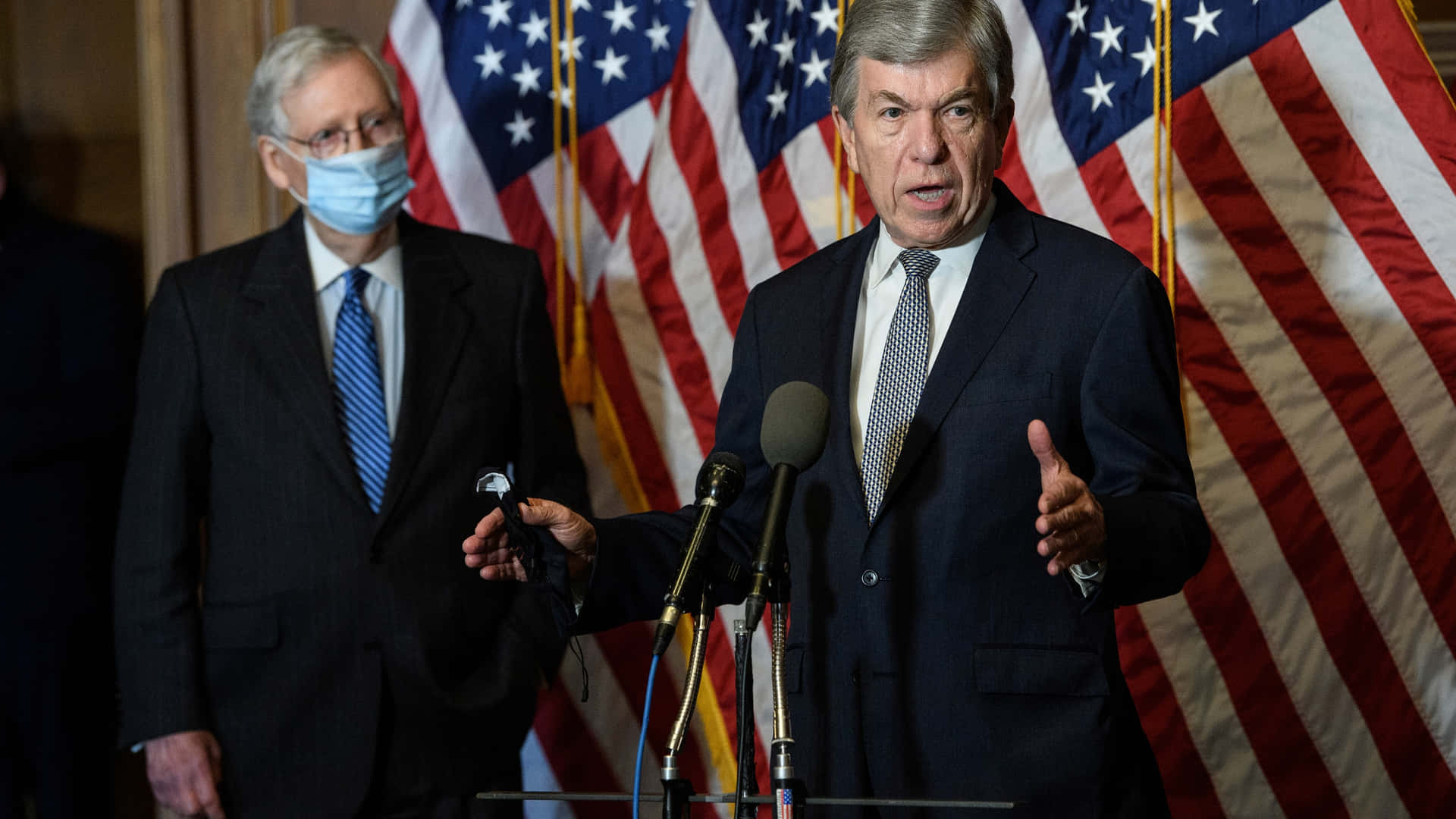 Roy Blunt Addressing The Audience Wallpaper