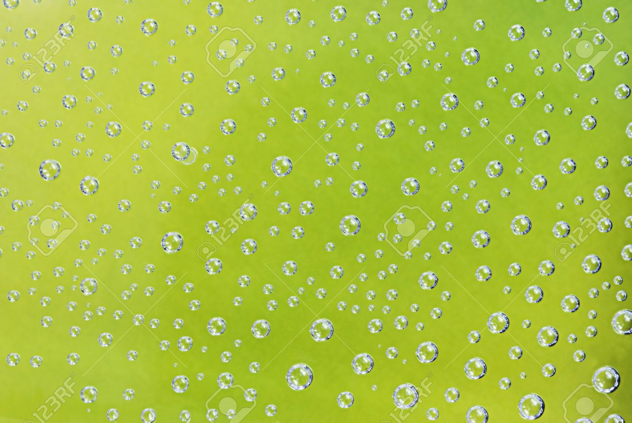 Soda Bubbles On A Green Background Stock Photo Picture And