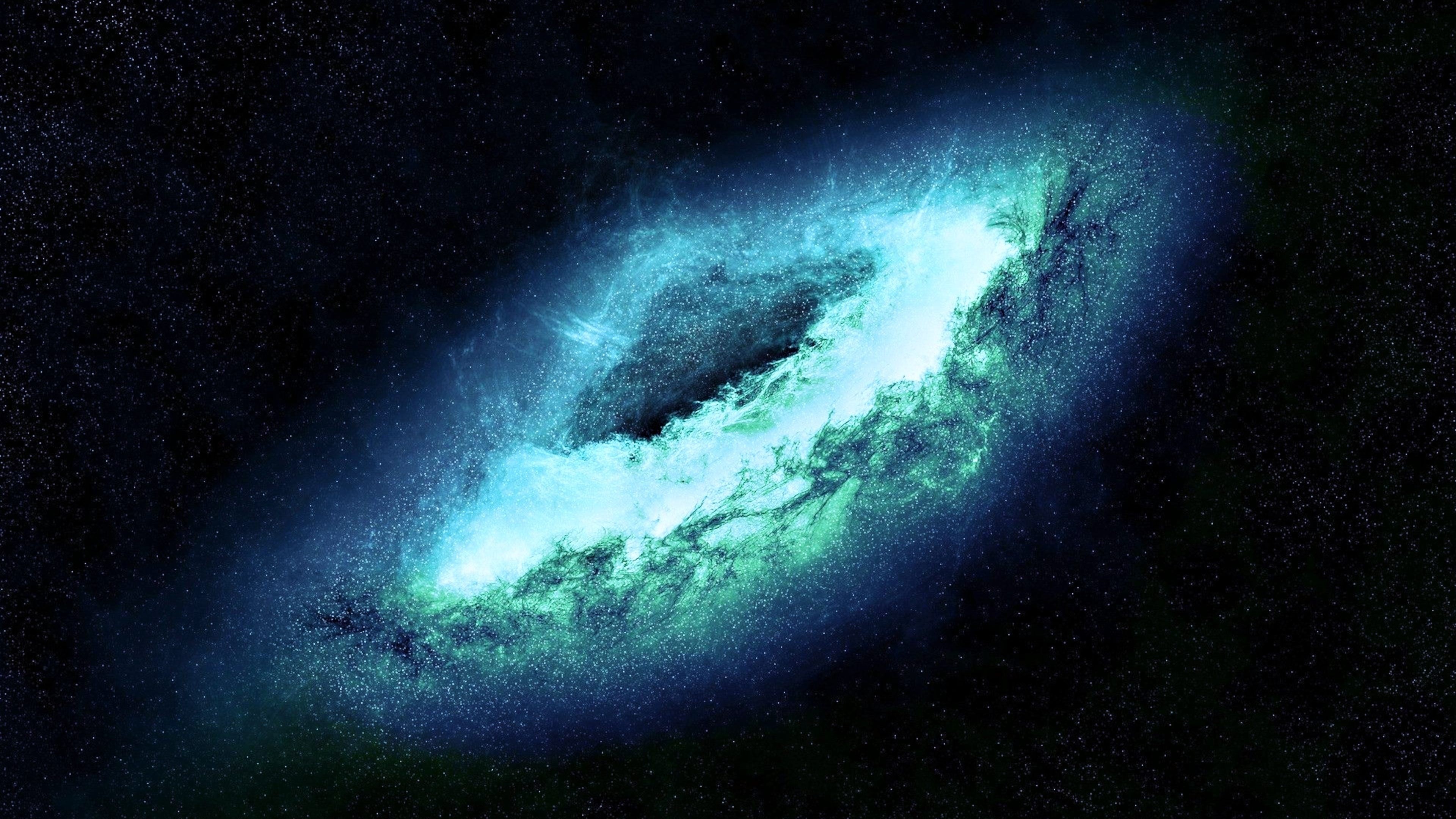 A breathtaking view of a spiral galaxy, showcasing its vibrant teal and blue hues against a backdrop of distant stars