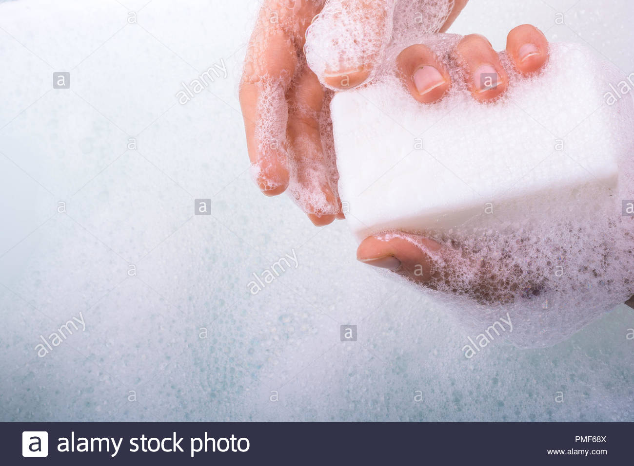 Hand Washing And Soap Foam On A Foamy Background Stock Photo