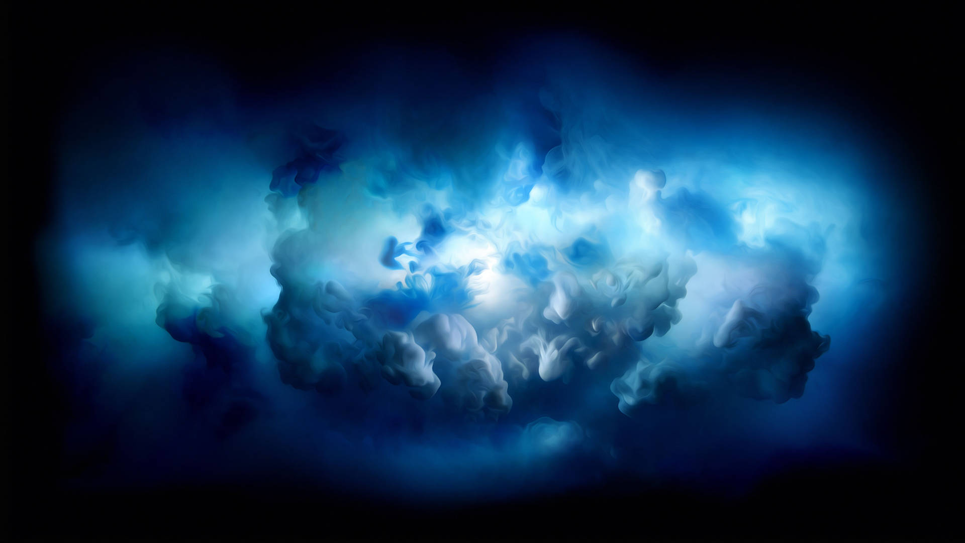 Abstract blue smoke cloud formation on a dark background, resembling a nebula or cosmic explosion, suitable for a MacBook Pro 4k wallpaper