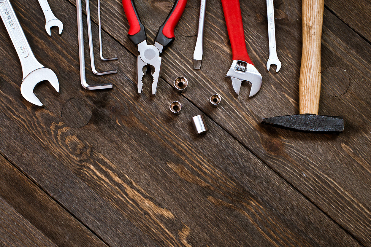 Tools On A Wooden Background Gorapid Plumbing Mercial And