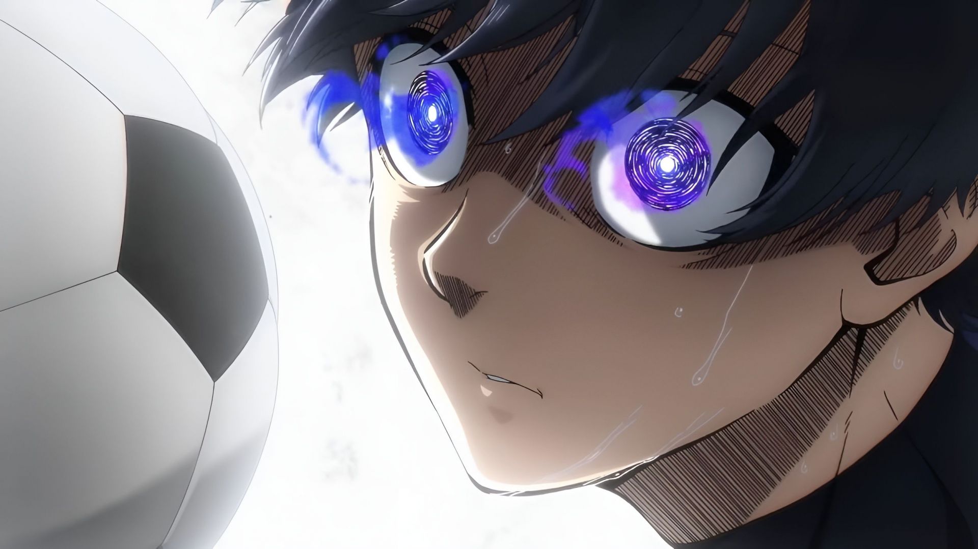 Close-up of Isagi Yoichi with glowing blue eyes, focused on a soccer ball, from the anime 'Blue Lock'