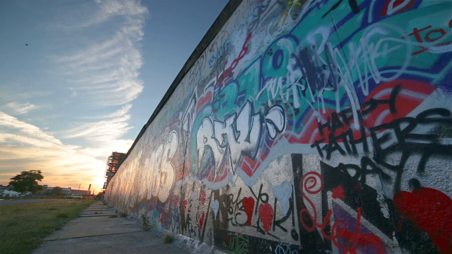 Sunset At Graffiti Covered Berlin Wall Bird Flying Overhead