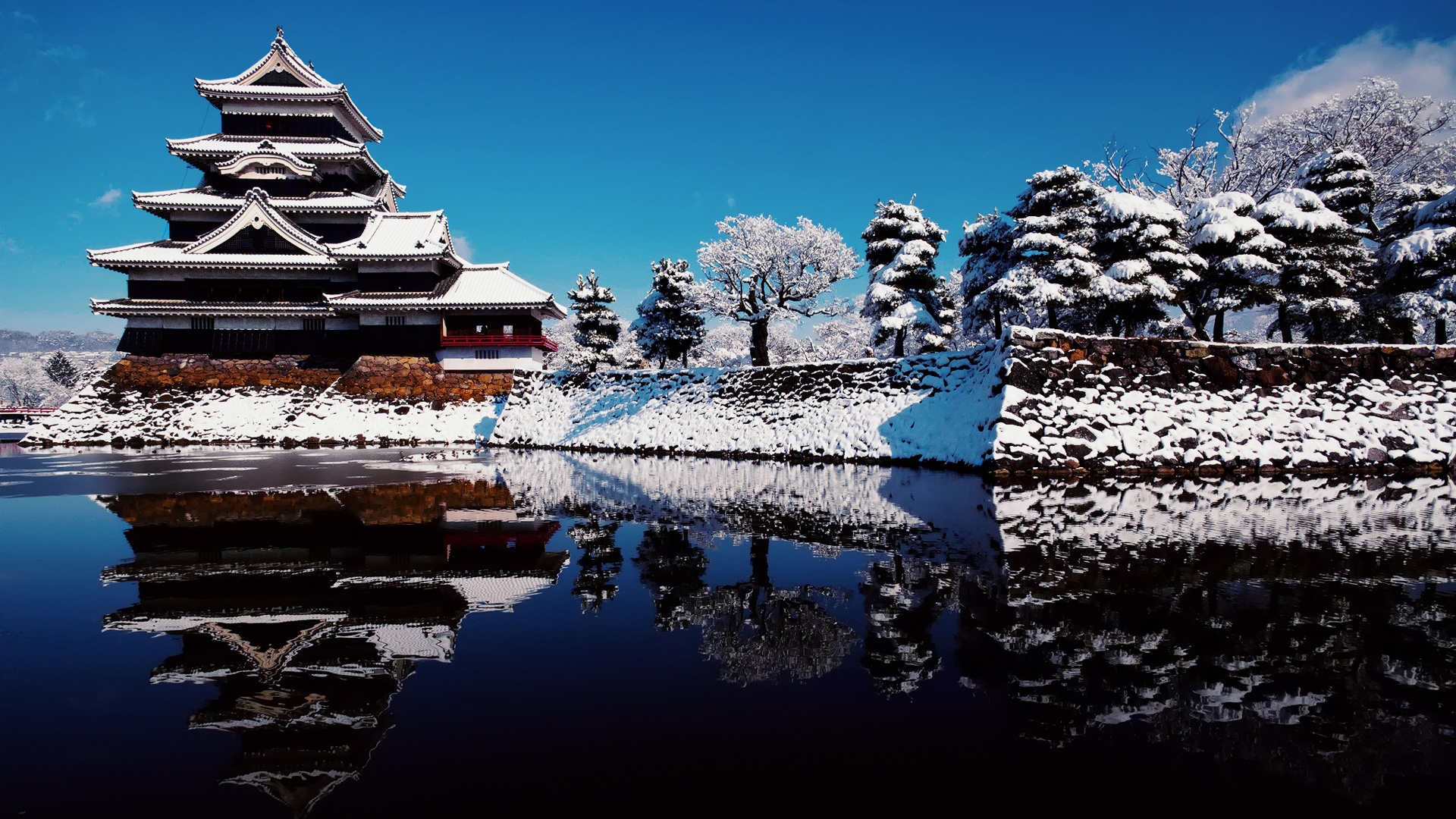 Japan Attractions in winter snow temple lake reflection and blue sky 1920x1080