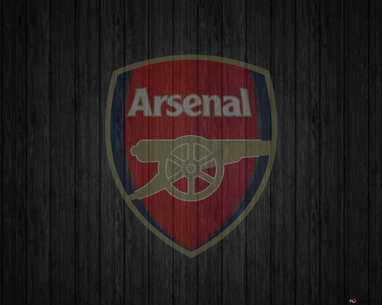 Logo Of Arsenal Football Club Designed On A Black Wooden