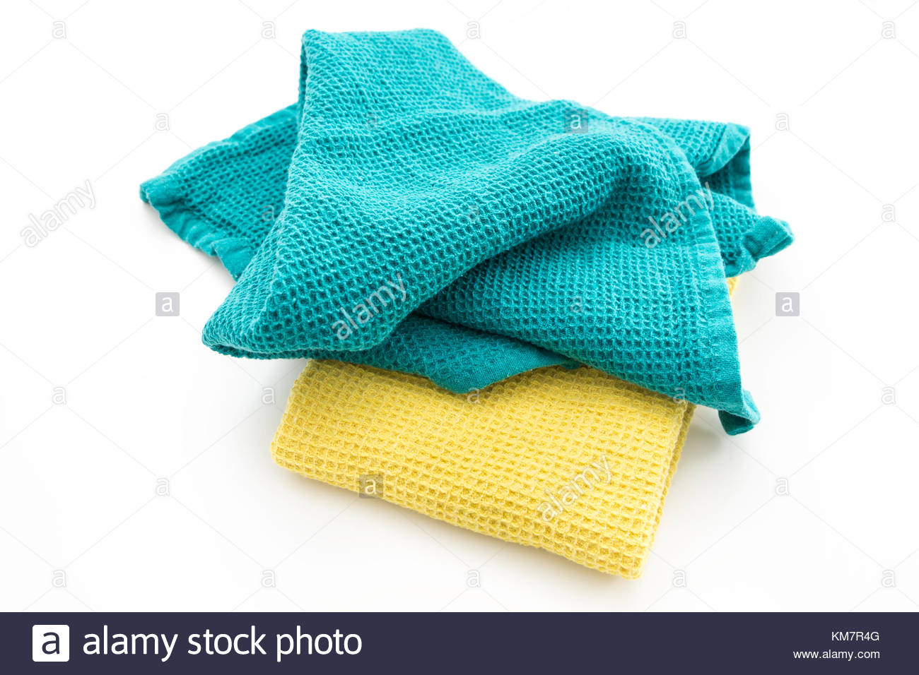 Messy And Folded Colorful Kitchen Towels On White Background