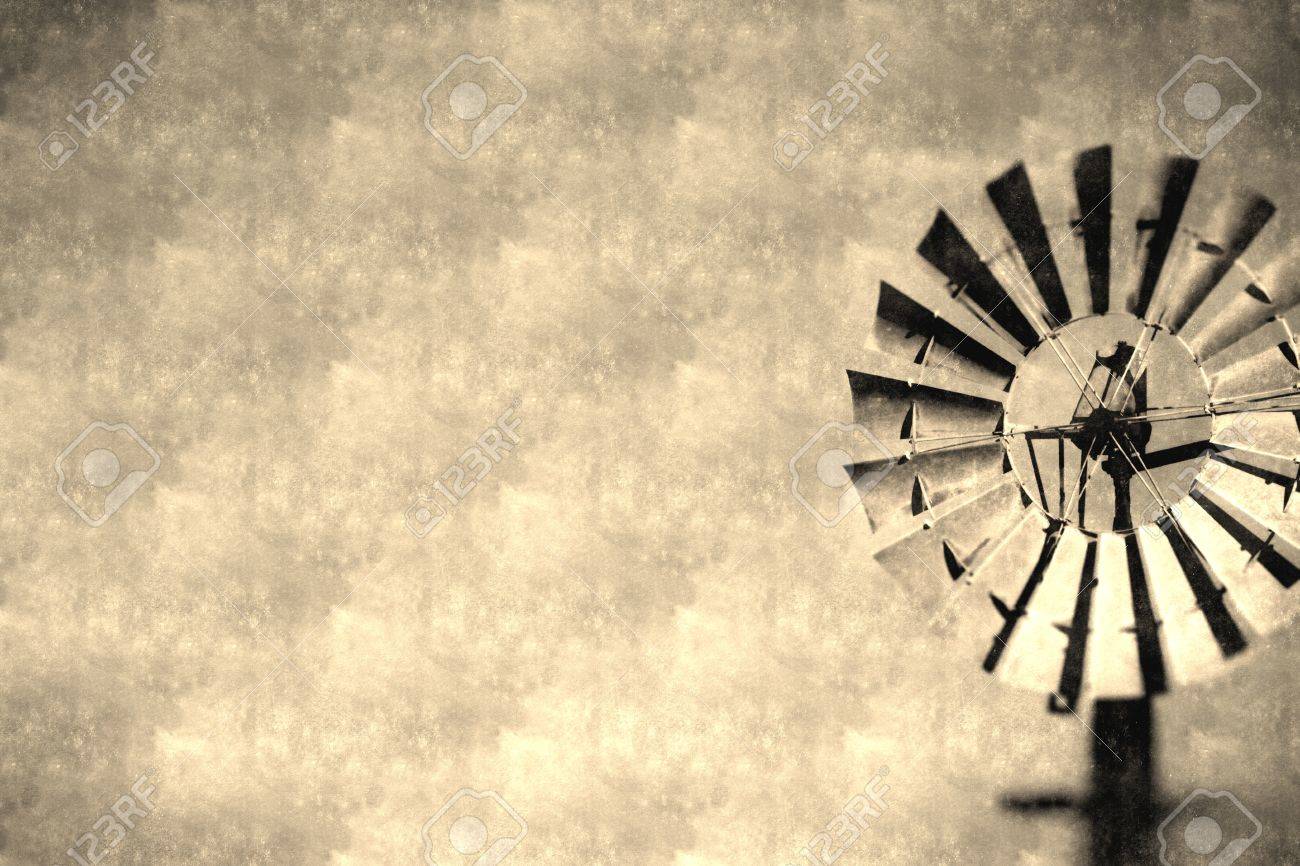Vintage Windmill Background On Rural Farming Property Pumping