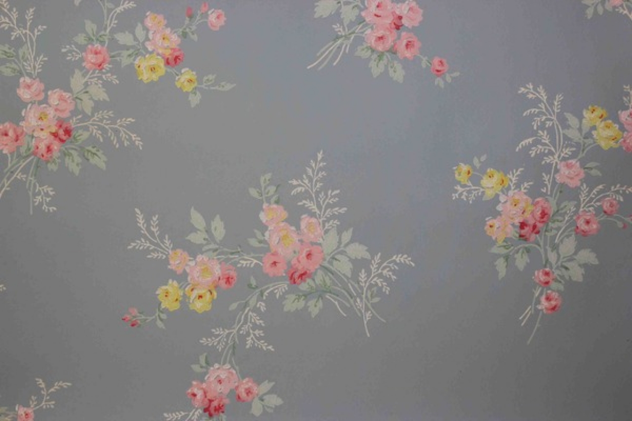 This Roll Of Vintage Wallpaper Has Pink And Yellow Rose Bouquets On A