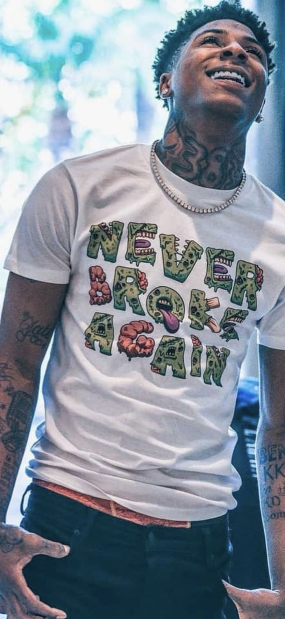 NBA Youngboy Is Wearing White TShirt And Green Overcoat Standing In Blue  Sky Background HD NBA Youngboy Wallpapers  HD Wallpapers  ID 81991