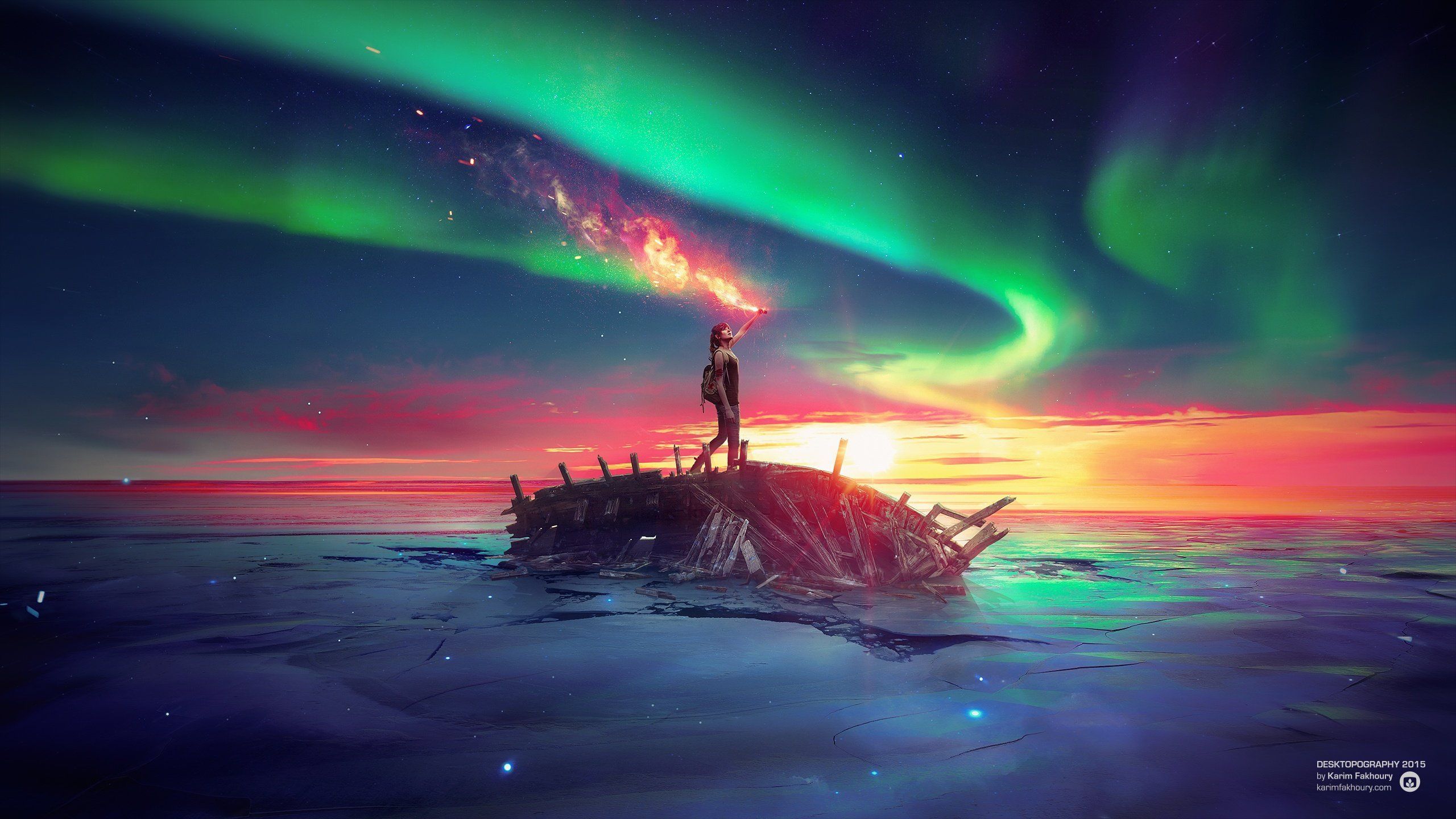A person stands on a shipwreck, silhouetted against a vibrant sunset and colorful aurora borealis, holding a flare that emits a stream of orange light into the sky