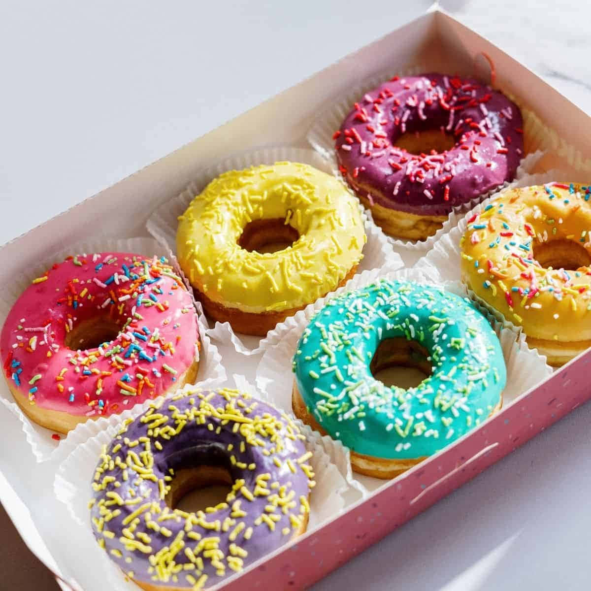 Deliciously Sweet And Irresistible Glazed Donuts Wallpaper