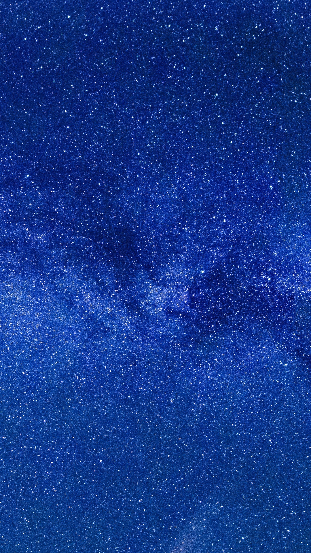 A breathtaking view of a dark blue night sky filled with countless twinkling stars, resembling a vast and sparkling universe