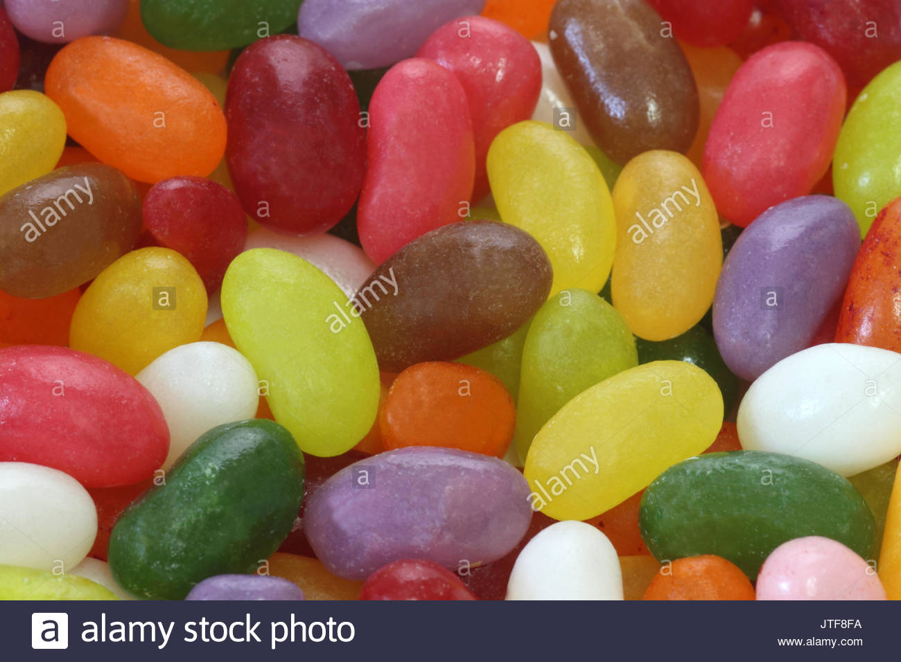 Lots Of Jelly Beans In A Colorful Background Chewy Goodness