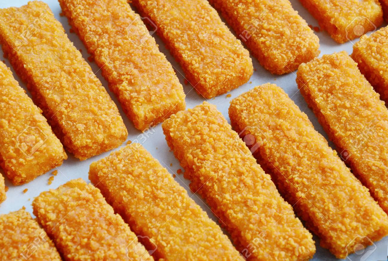 Free download Frozen Fish Sticks In Tray For Oven On Wooden Background