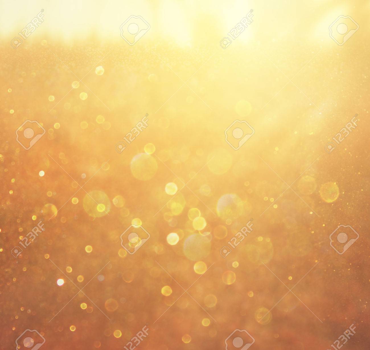 Gold And Warm Abstract Bokeh Lights Defocused Background Stock