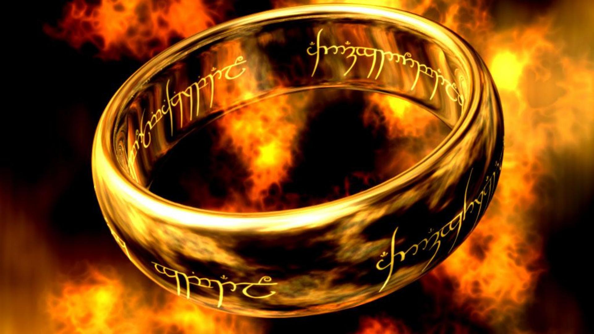 The One Ring from the Lord of the Rings, glowing amidst flames