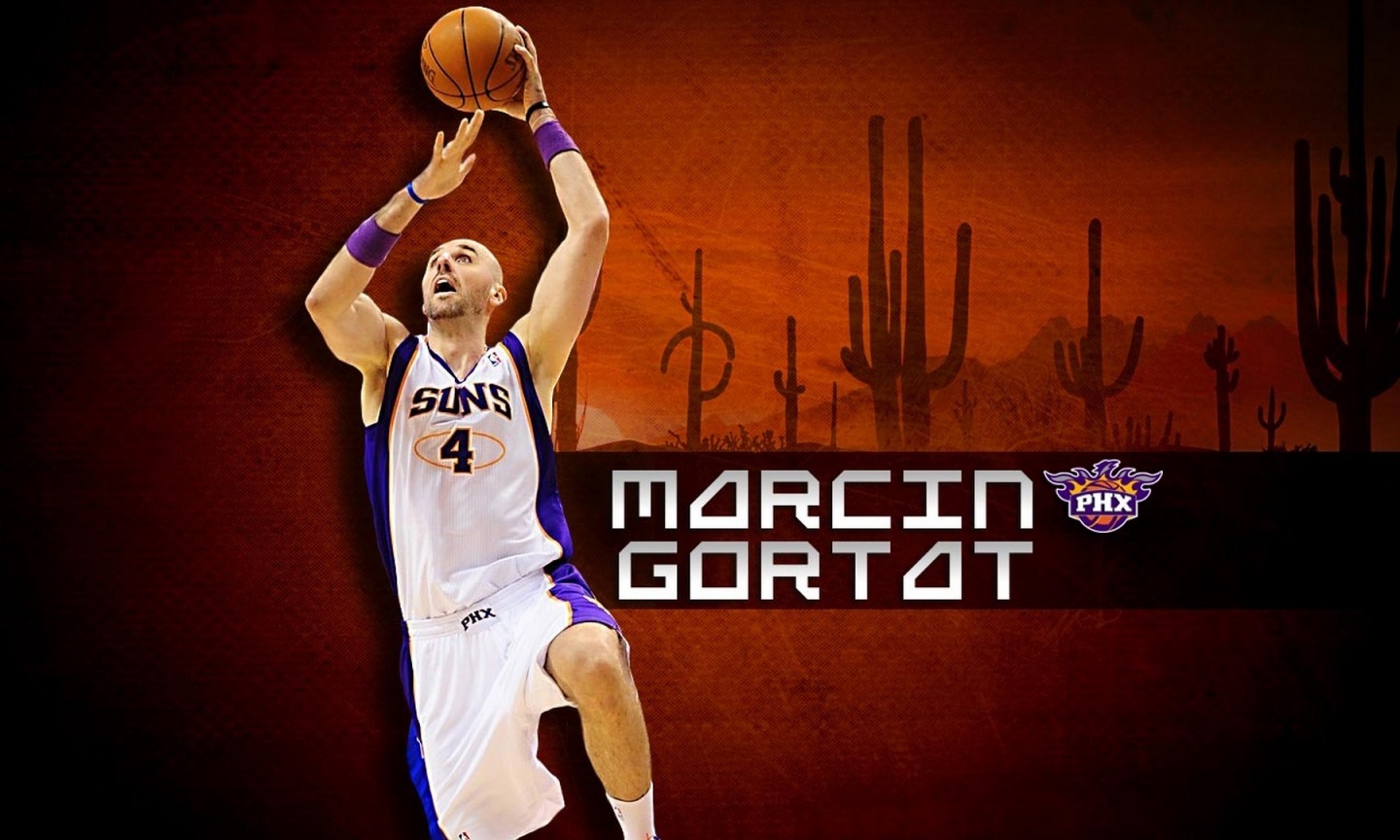 Phoenix Suns Player Marcin Gortat Number Four Lay Up Holding The