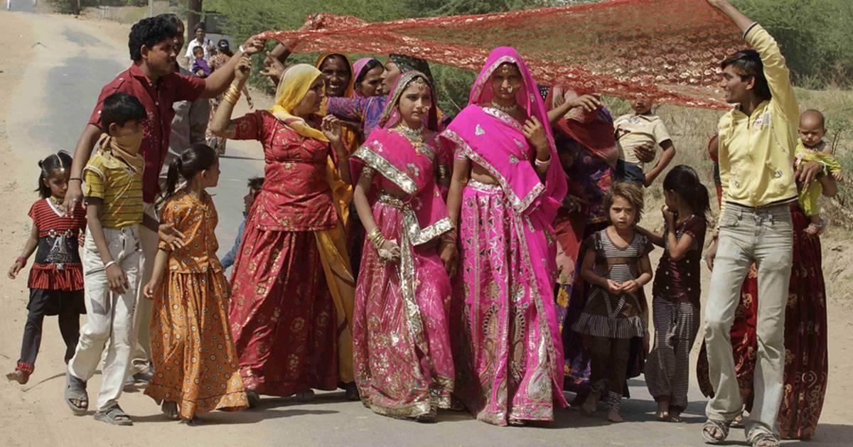 Indian mothers hold mass wedding in village of sex workers to