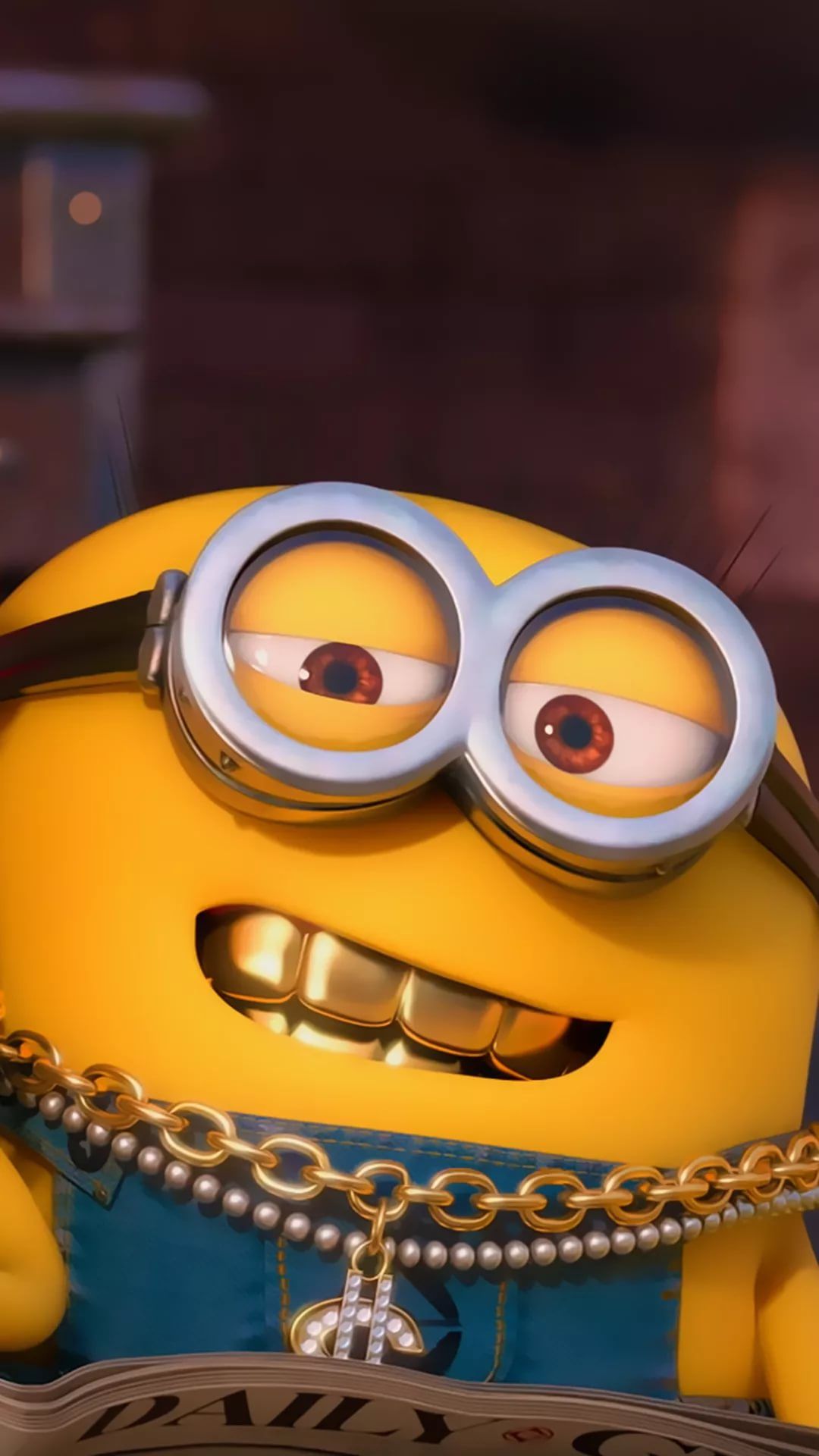 Close-up of a Minion from Despicable Me, wearing gold teeth, a gold chain with a dollar sign pendant, and reading a newspaper