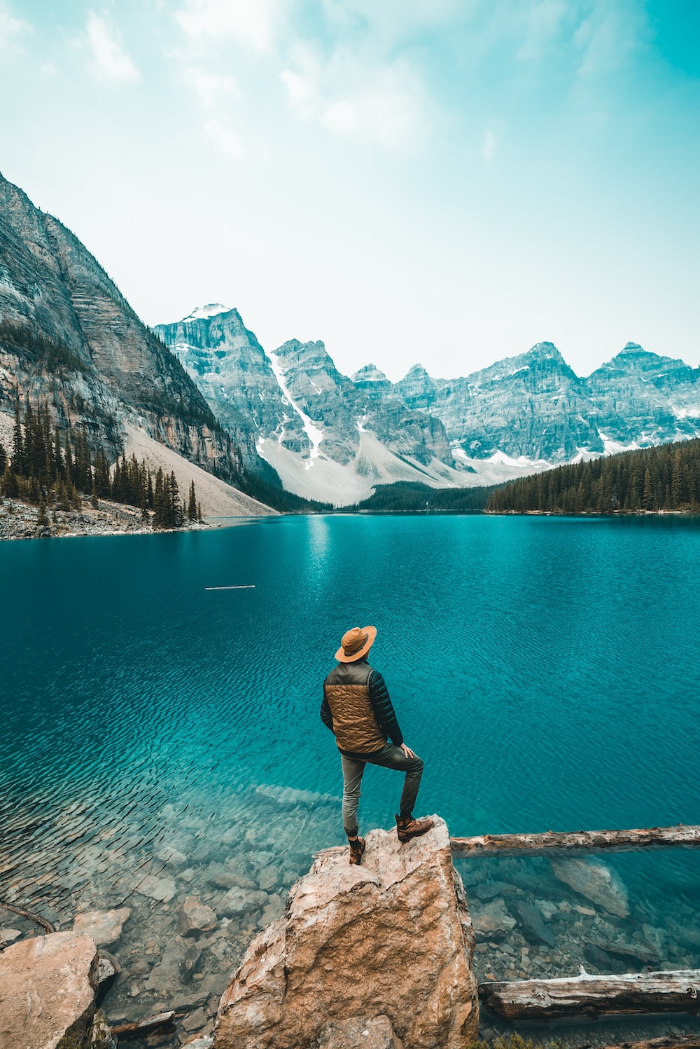 Man Standing On Rock Near Lake Photo Canada Image