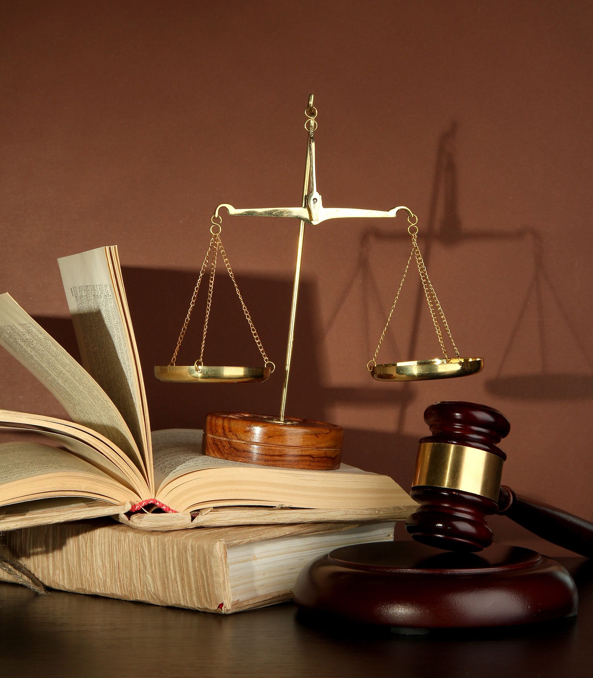 Golden Scales Of Justice Gavel And Books On Brown Background Siegel