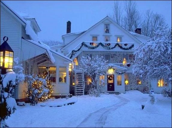 Christmas Decorated Houses Covered With Snow Wallpaper