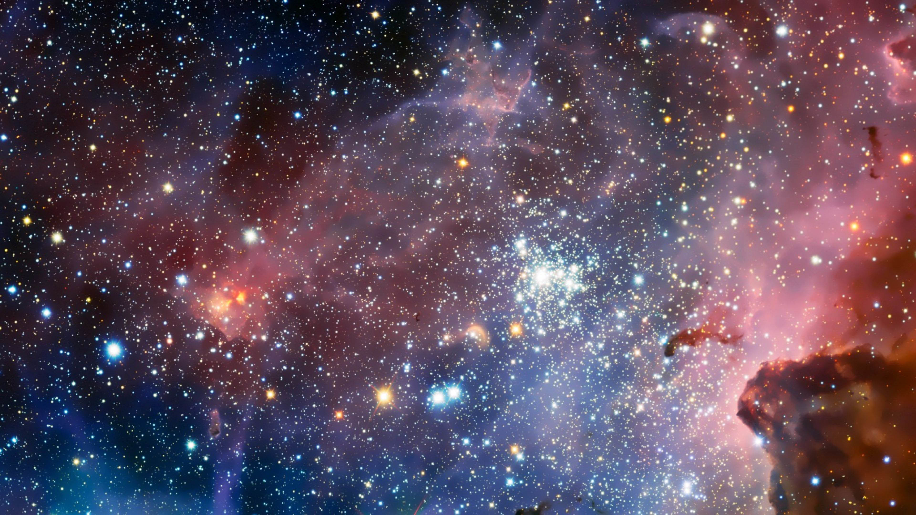 A breathtaking view of a nebula, a cosmic cloud of gas and dust, illuminated by the light of nearby stars. This stunning astronomy wallpaper showcases the vibrant colors and intricate structures of the nebula, offering a glimpse into the vastness and beauty of space