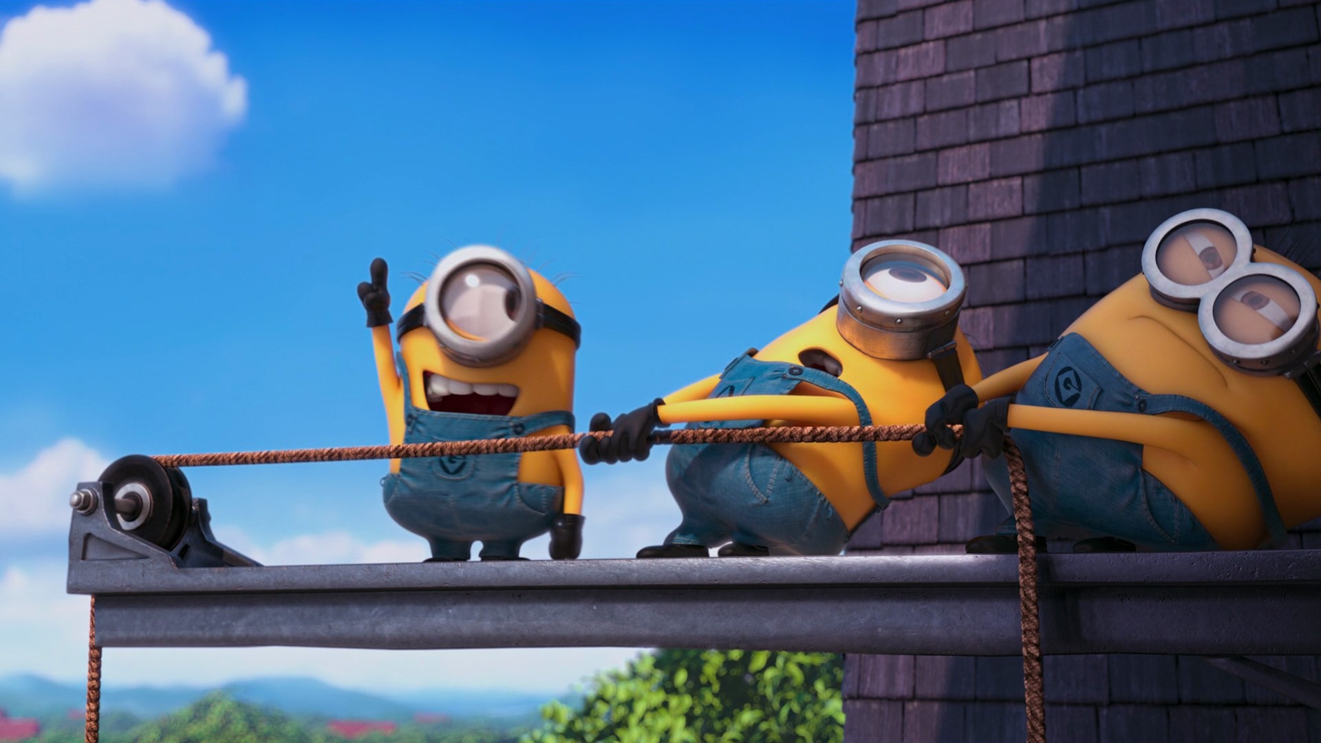 Three Minions Pulling a Rope on a Rooftop in Despicable Me