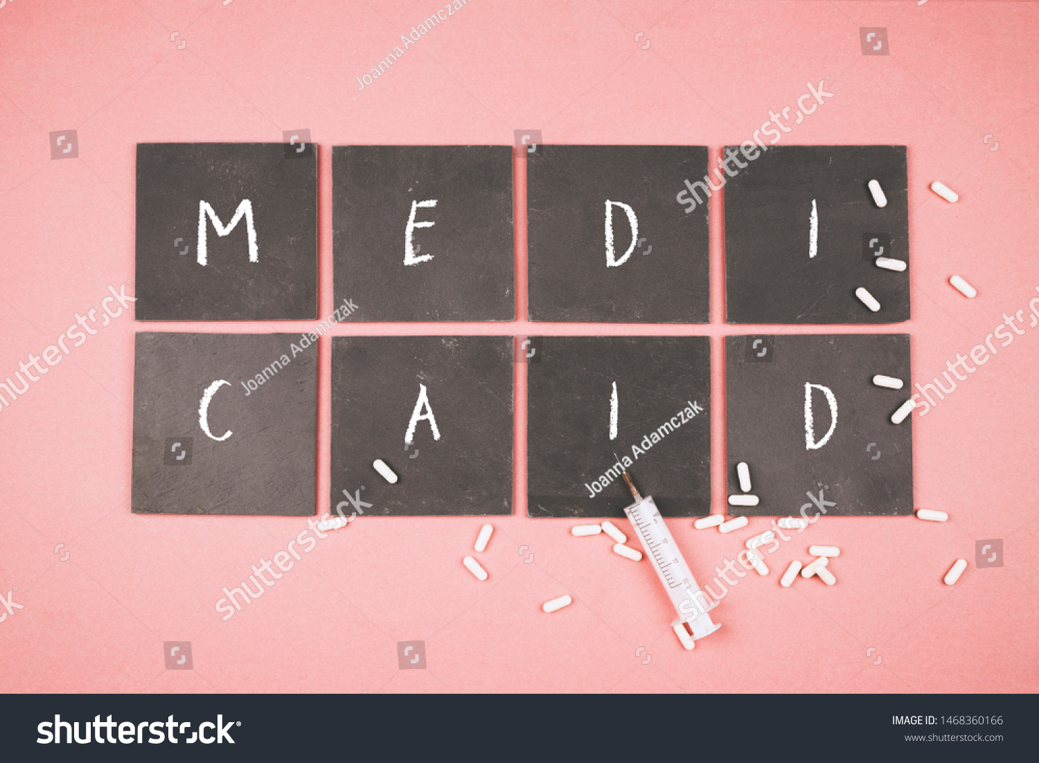 free-download-white-medicaid-inscription-on-pink-background-stock-photo