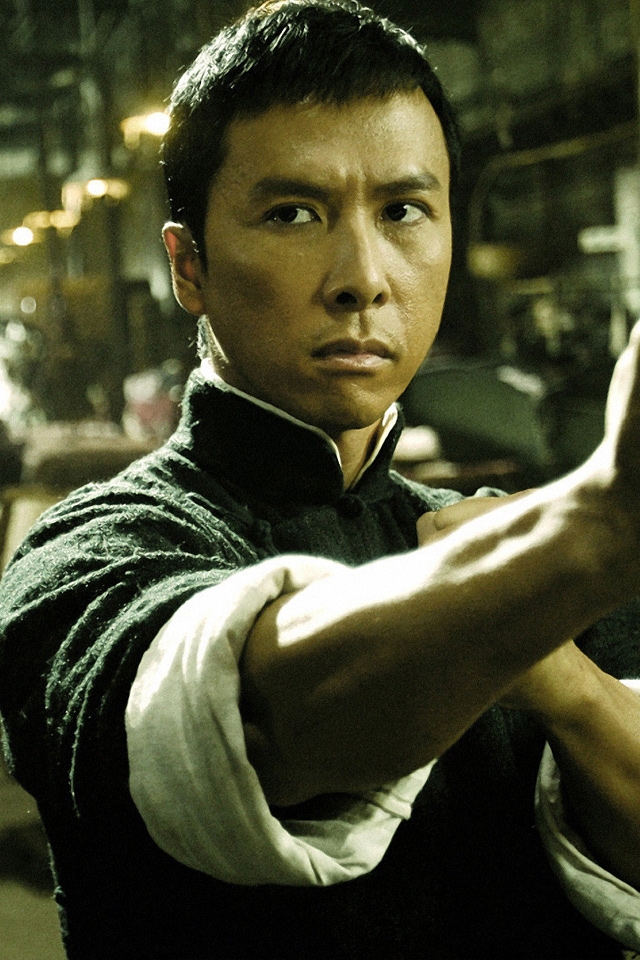 HD wallpaper: man in black tank top holding black semi-automatic pistol, Donnie  Yen | Wallpaper Flare