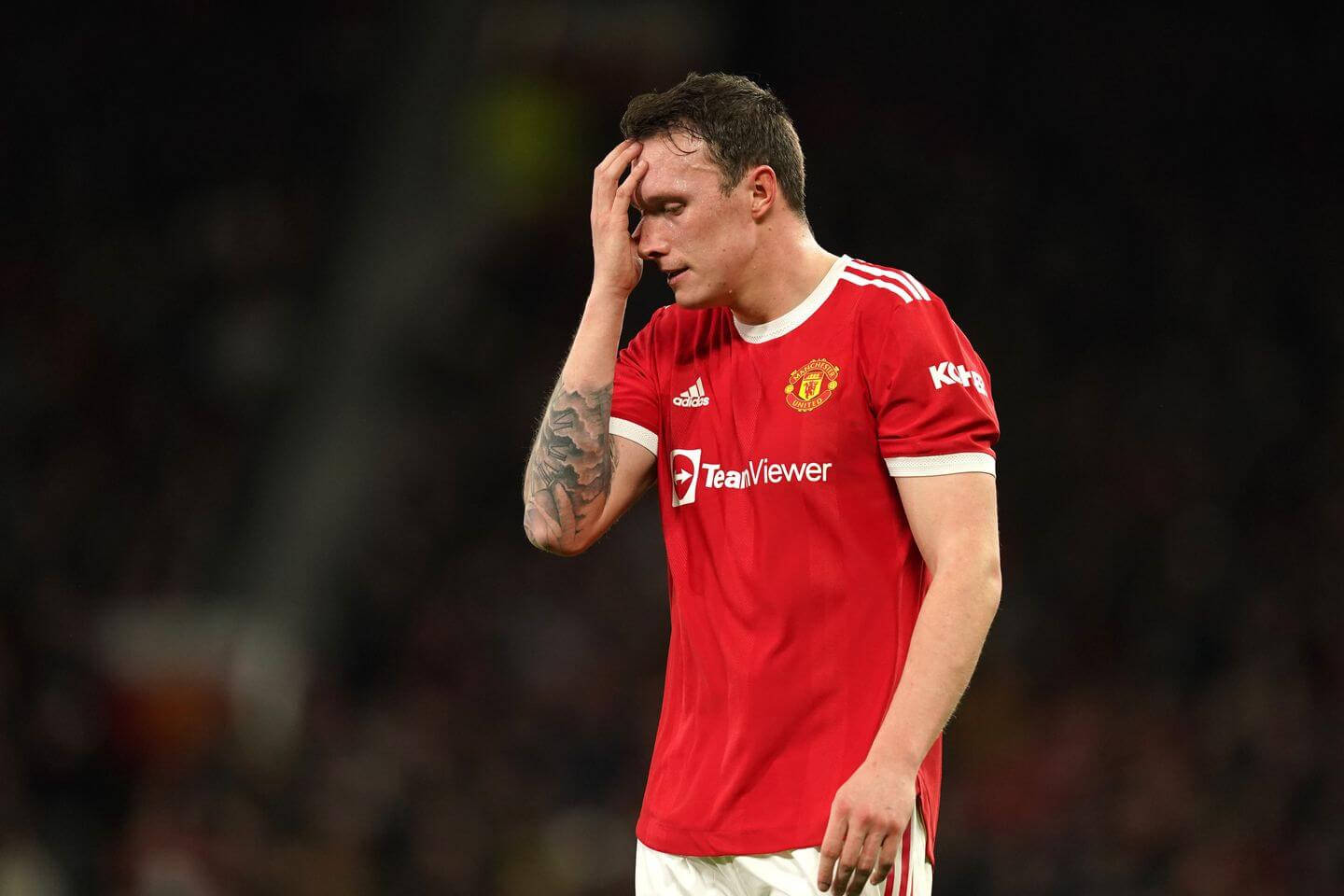 Phil Jones Facepalming During A Football Match Wallpaper