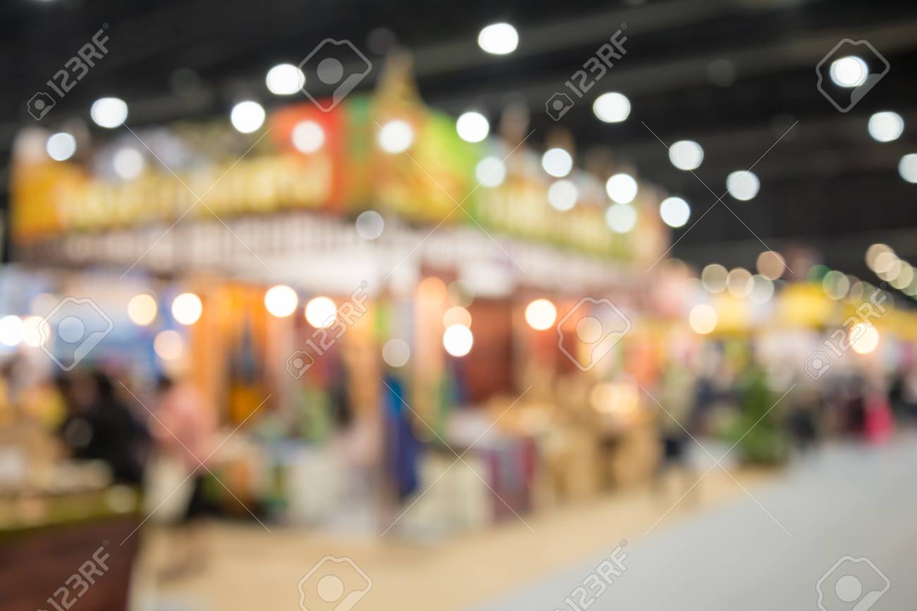 Abstract Blurred People In Shopping Trade Show Expo Background