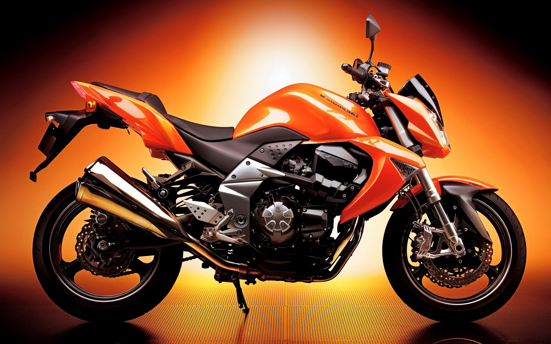 Orange Kawasaki Z750 Motorcycle on Orange Background