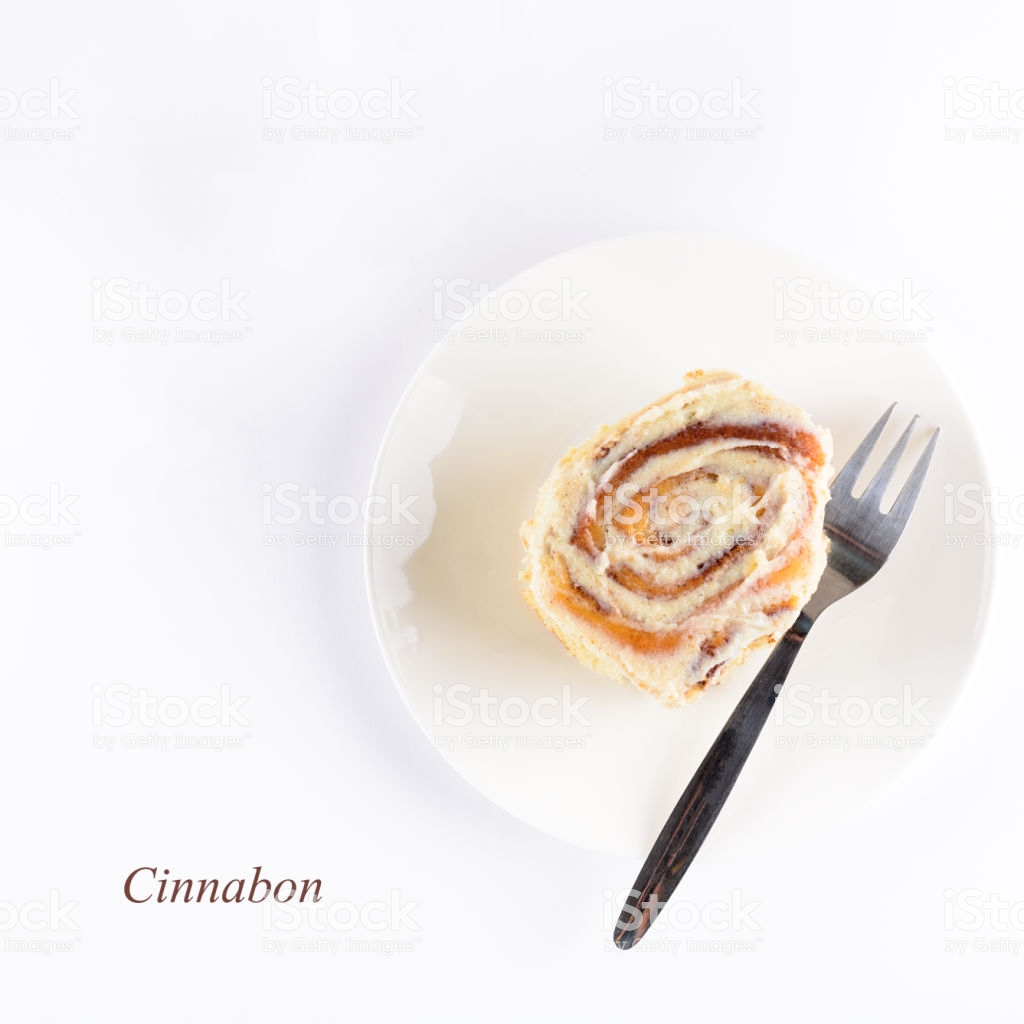 Fresh Cinnabon Roll With Glaze On White Background Homemade
