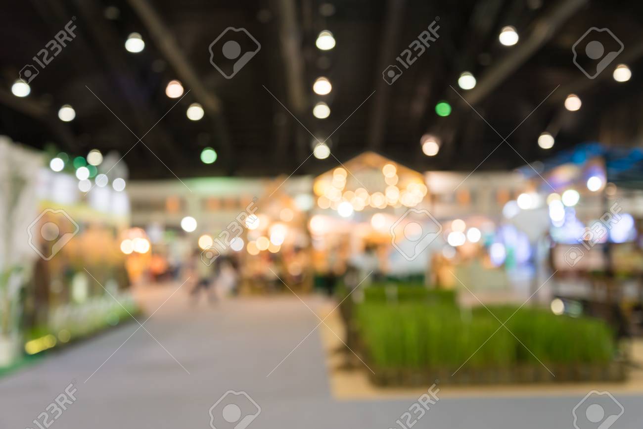 Abstract Blurred People In Trade Show Expo Background Usage Stock