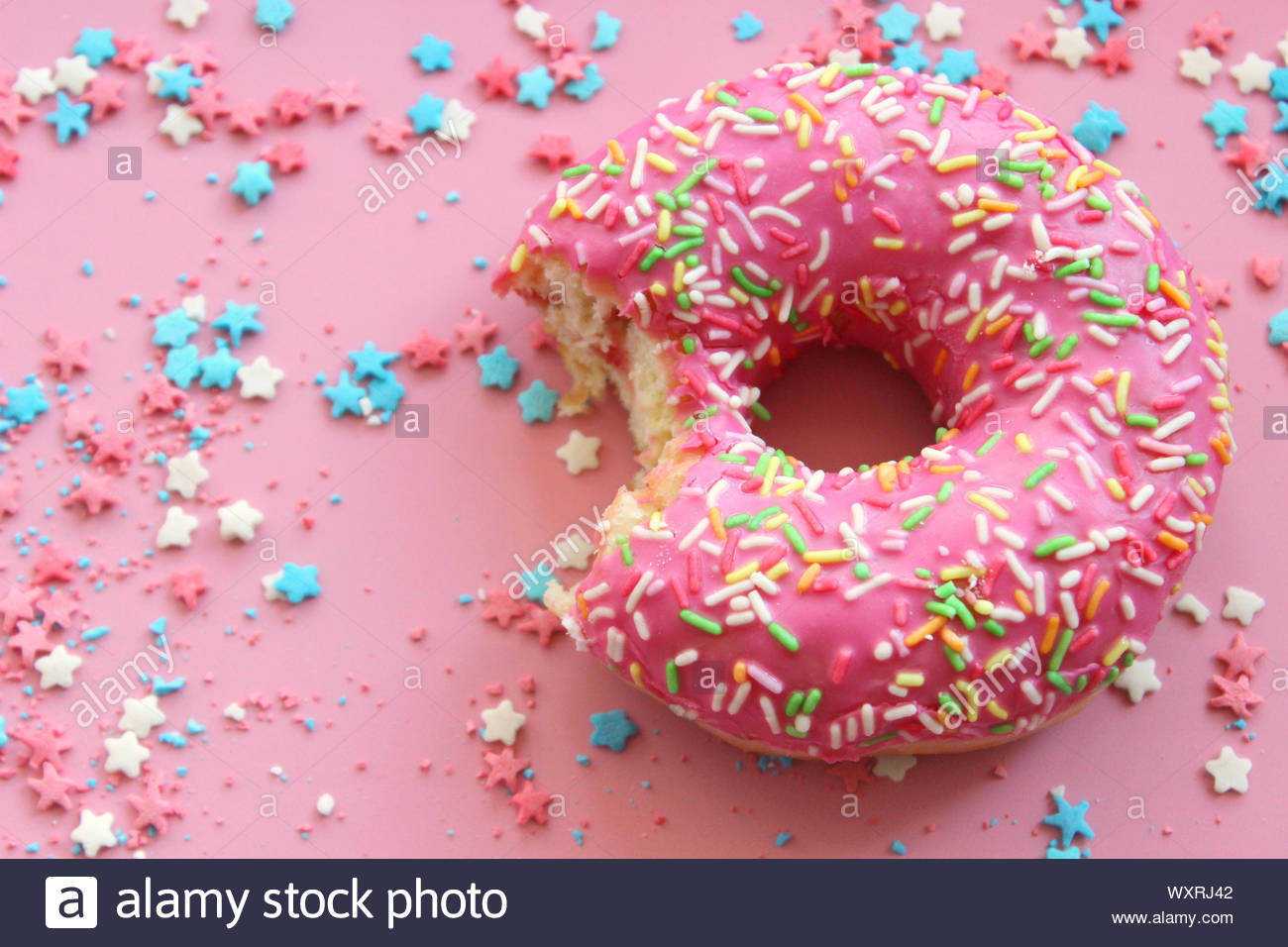 Pink Donut Surrounded By Sugar Filling For Cake Frame On