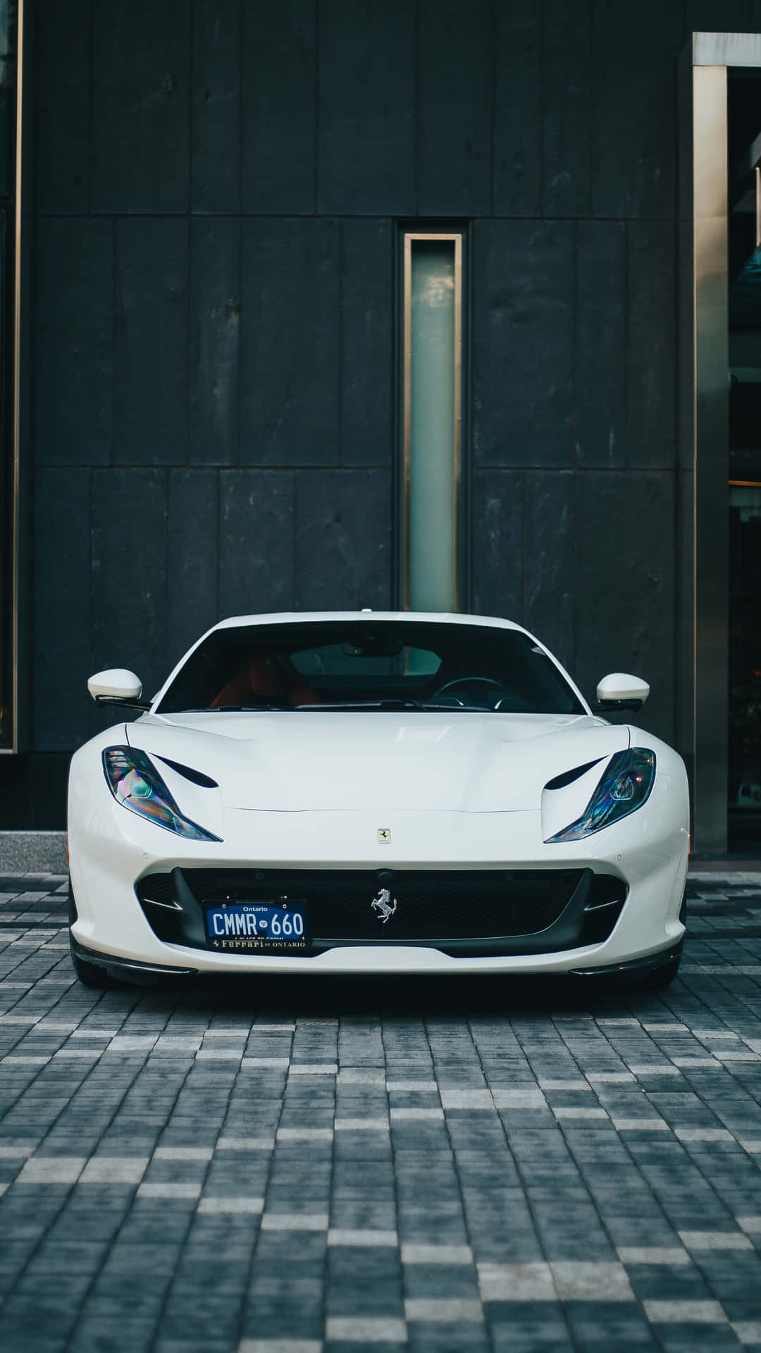 Driving Luxury In Style With A White Ferrari iPhone Wallpaper