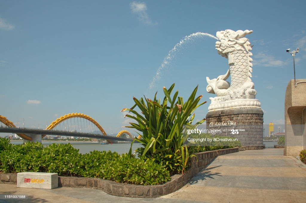 Carpdragon Statue And Dragon Bridge In Background Danang