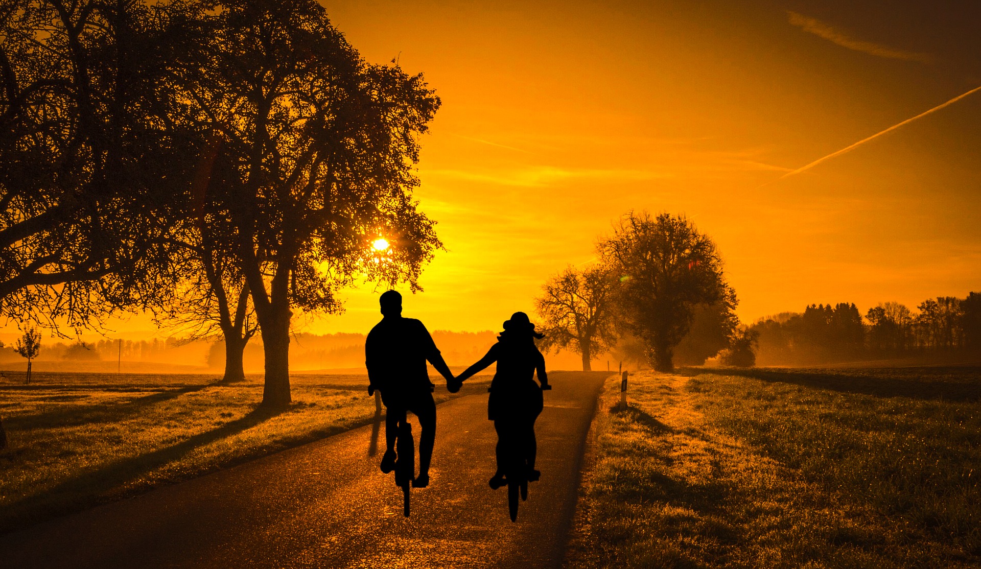 Cycling Into The Sunset Wallpaper